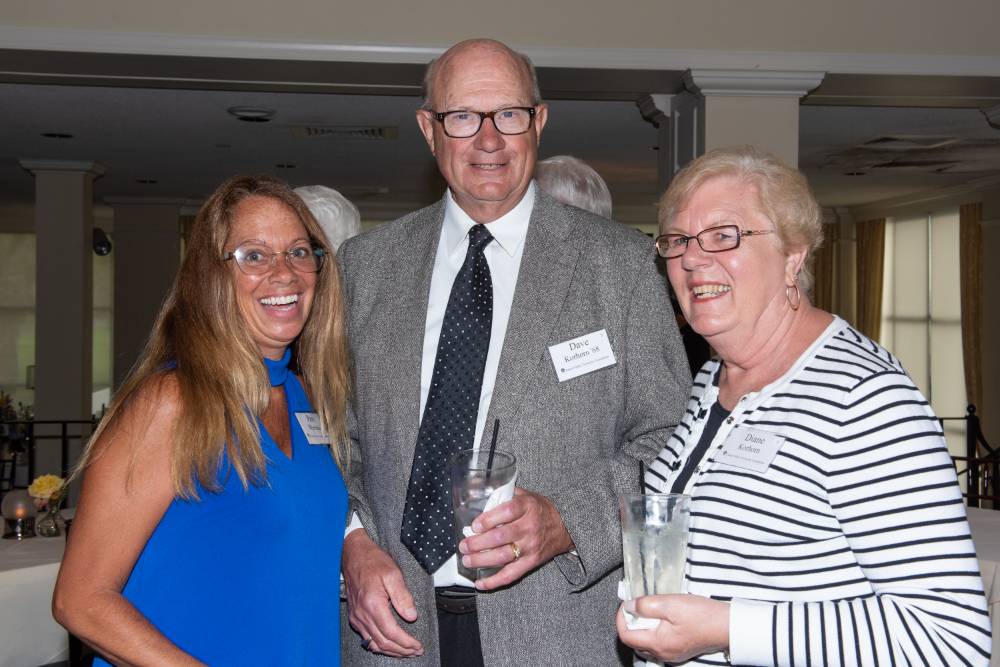 Three guests at the Sarasota event.